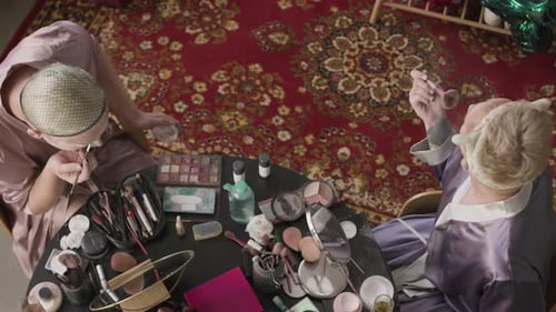 Queer Men Applying Makeup in Authentic Apartment