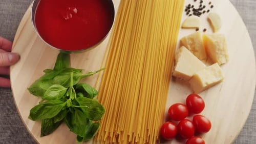 Colorful Pattern of Italian Pasta Tomatoes Sauce Penne Pasta Ingredients Olive Oil Spices and Basil
