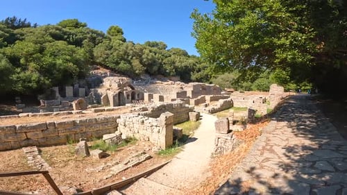 Panning at the entrance of the theater in the archaeological ruins of Butrint or Butrinto National P