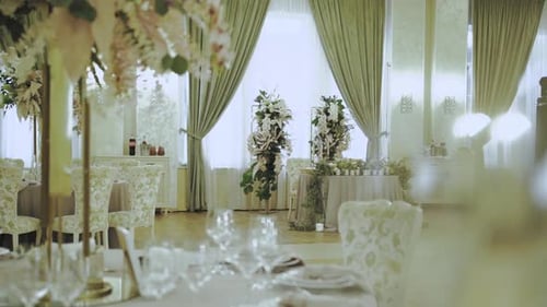 Elegant Indoor Wedding Decoration with Floral Arrangements