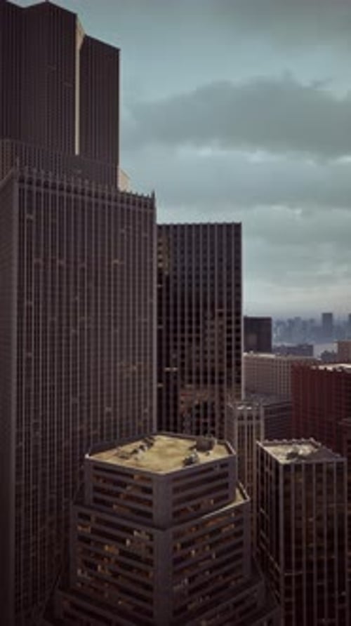 Smooth Vertical Pan Over Modern City Buildings