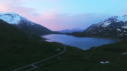 Mont Cenis lake and mountains at sunset