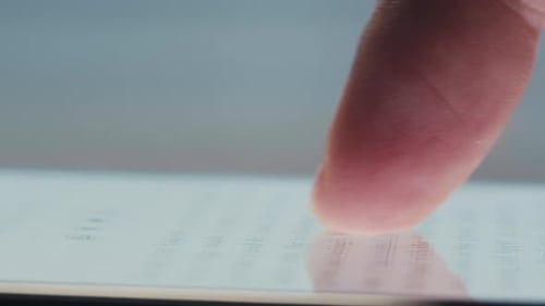 Man Read Daily News on the Internet Newsline Swipe Phone Screen Smartphone Cell Phone Close Up Macro