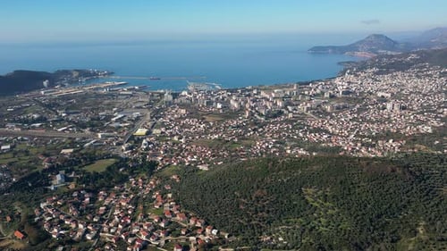 Bar, Montenegro. Panoramic drone shot of city buildings, sea and harbor