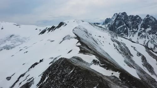 Cinematic revealing drone shot of the Georgian Dolomites in the Caucasus mountains in Georgia