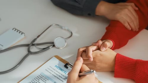 Couple Attend Fertility Or Medical Consultation With Gynecologist At Hospital As Family Planning.