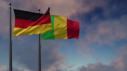 Waving Flags of Germany and Mali on Cloudy Sky