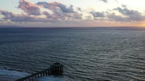 Manhattan Beach Pier And Seascape At Dusk In California, USA. - aerial shot