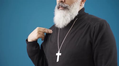 Man Making the Sign of the Cross