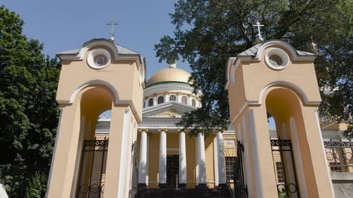 A low angle slide zooming view of a Church entrance.