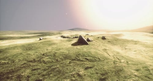 Vast Desert Landscape Under a Radiant Sky During Twilight Hours