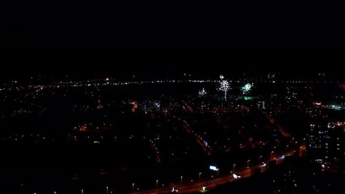 Fireworks Light Up the Night Sky Over City