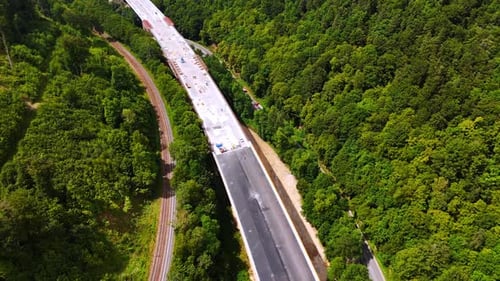 Wide freeway being built over the highways.