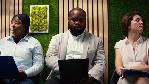 Professional Diverse Candidates Awaiting Start of Job Interview