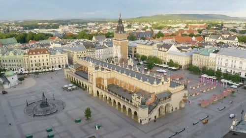 Beautiful Orbiting Drone Shot Above Krakow Old Town, Cloth Hall, Town Hall Tower