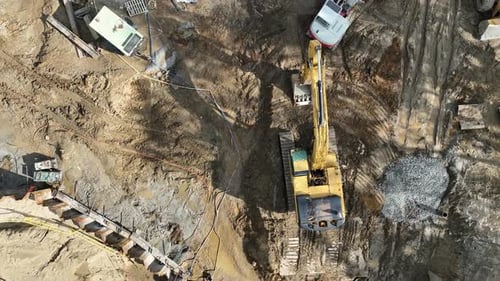 Excavator Working on an Urban Construction Site