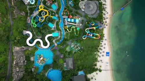 Top View Aerial of Tropical Resort with Adventure Waterpark Aquapark Water Slides and Pool Area