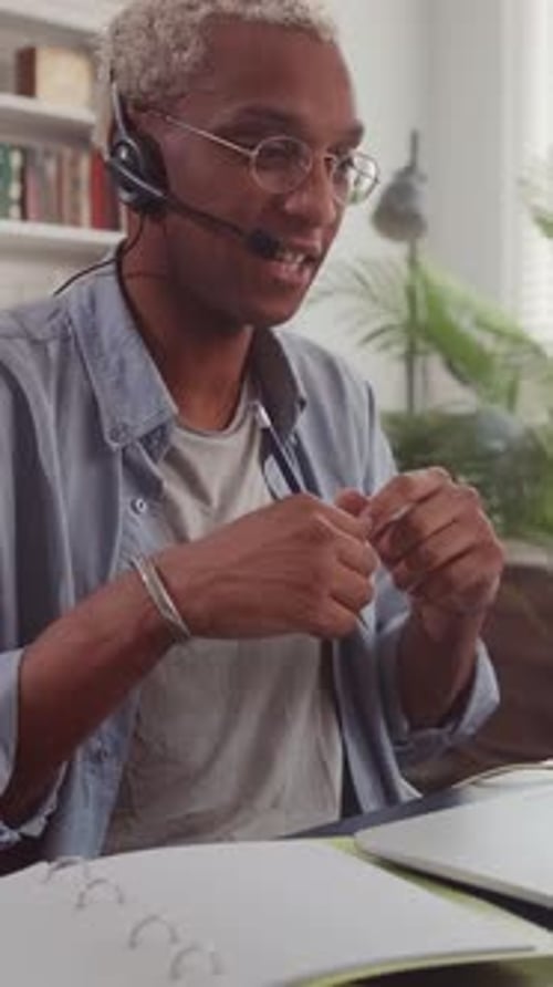 Young Adult Working and in a Virtual Meeting