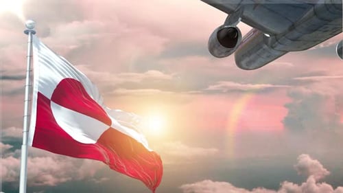Greenland Flag Waving with Airplane Flying at Sunset