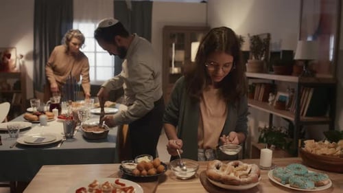 Family Prepares Holiday Meal in Cozy Home Setting