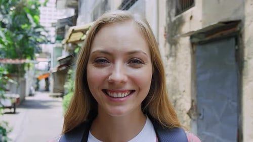 Smiling Backpacker Portrait on Bangkok Street