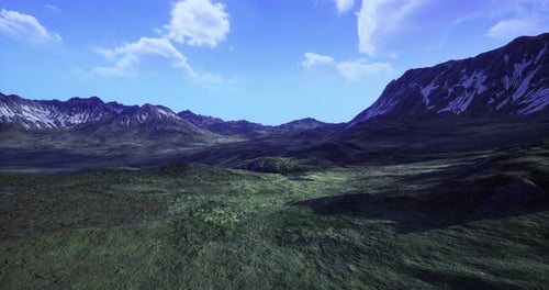 Breathtaking Mountain Landscape with Lush Green Valley Under Clear Blue Sky