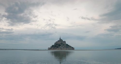 Dramatic View Of Mont Saint-Michel Castle On Rocky Islet In Normandy Région, France. Wide Shot