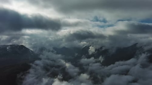 Aerial High View of Dramatic Clouds Flying