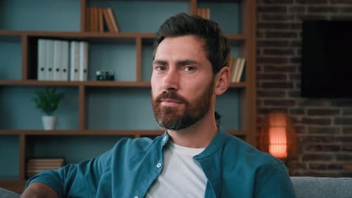 Head Shot Handsome Bearded Caucasian Guy Confident Serious 30s Male Portrait Wears Casual Blue Shirt