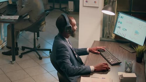 Company Executive Enjoying Music