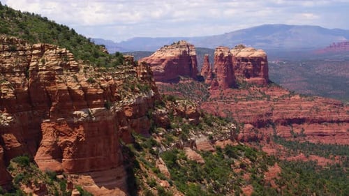 Red and green cliffs of sedona Arizona captured by drone in stunning aerial view