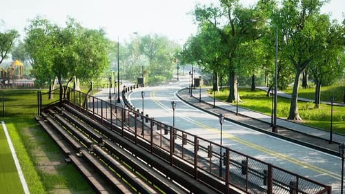 Empty Asphalt Road in City with Trees