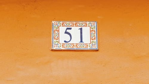 Number 51 (fifty-one) Affixed to a Building