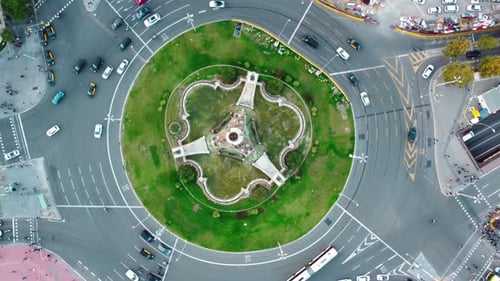 Aerial view of Plaça d'Espanya (Square of Spain) in Barcelona showing some traffic and people walkin