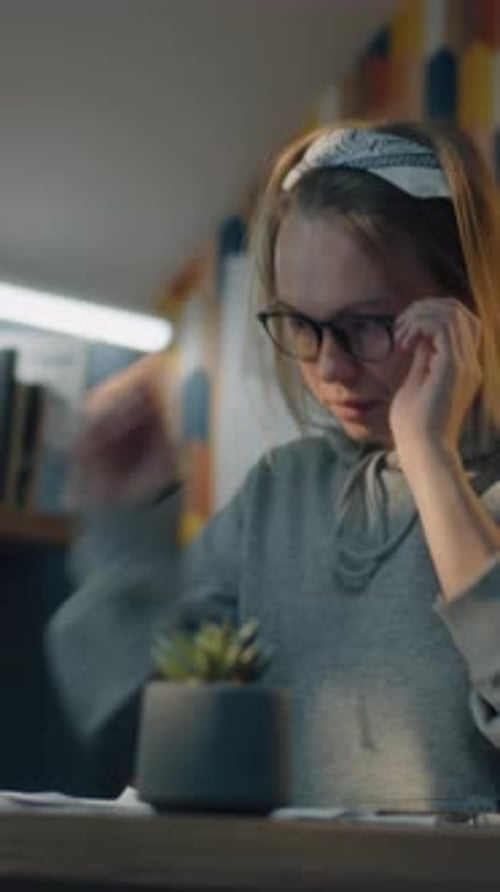 Creative Designer Starts Working on Her Sketches After a Break Puts on Glasses