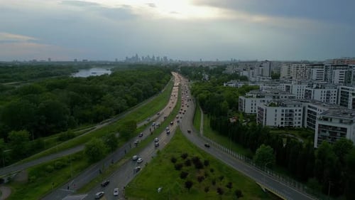 City Buildings And Roads In Warsaw, Poland At Sunset - Aerial Drone Shot
