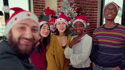 Multiethnic Group of Employee Recording Video in Festive Office