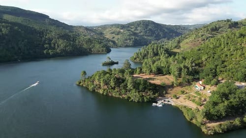 Aerial view of a lake surrounded by mountains, Spain.