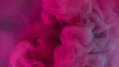 Abstract Pink and Blue Plumes Underwater