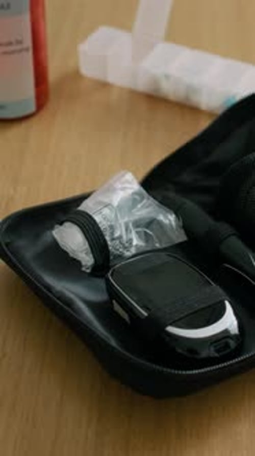 Blood Glucose Monitor Supplies in a Carrying Case