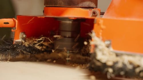 CNC router cuts wood, close up footage