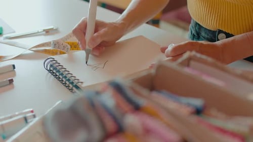 Woman Work on DIY Hobby Sewing Project in Studio