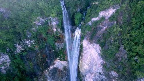 Aerial View Waterfall of Mountain Falling in Green Nature of Forest Landscape
