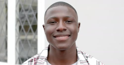 Young Adult Smiling at the Camera