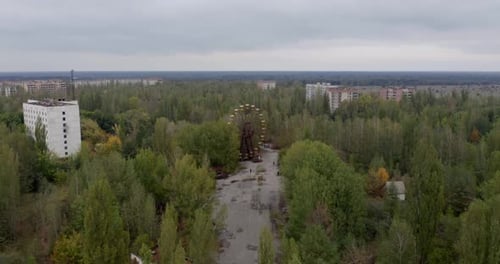 Flying Above Deserted Amusement Park In Pripyat, Ukraine With View Of Rusty Ferris Wheel - Chernobyl