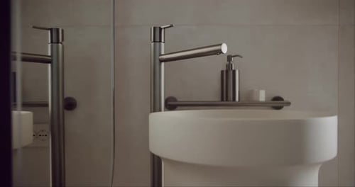 Modern Bathroom with Stand-Alone Sink and Silver Faucet