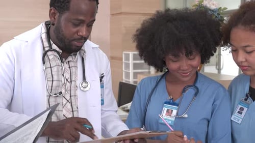 Group of doctor write on clipboard in the ward, Healthcare professionals