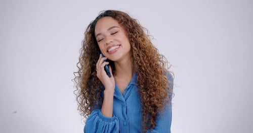 Smiling Woman Talking on Mobile Phone