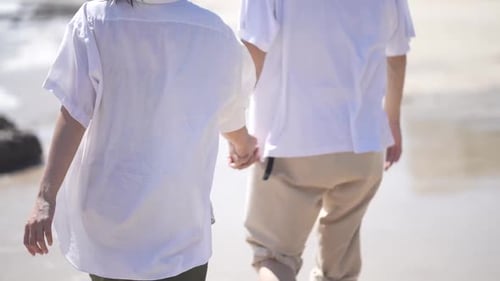 couple walking on the beach