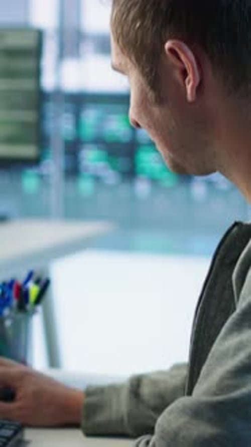 System Administrator in Server Room Doing System Analysis Coding